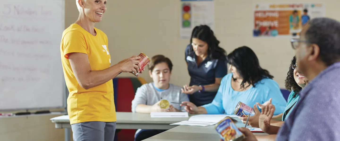 An associate helping YMCA members