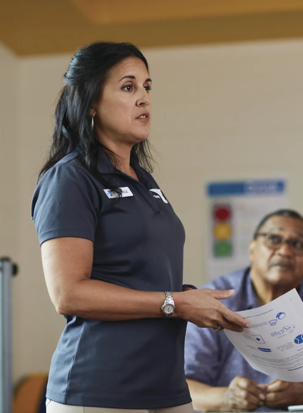 YMCA employee talking to group