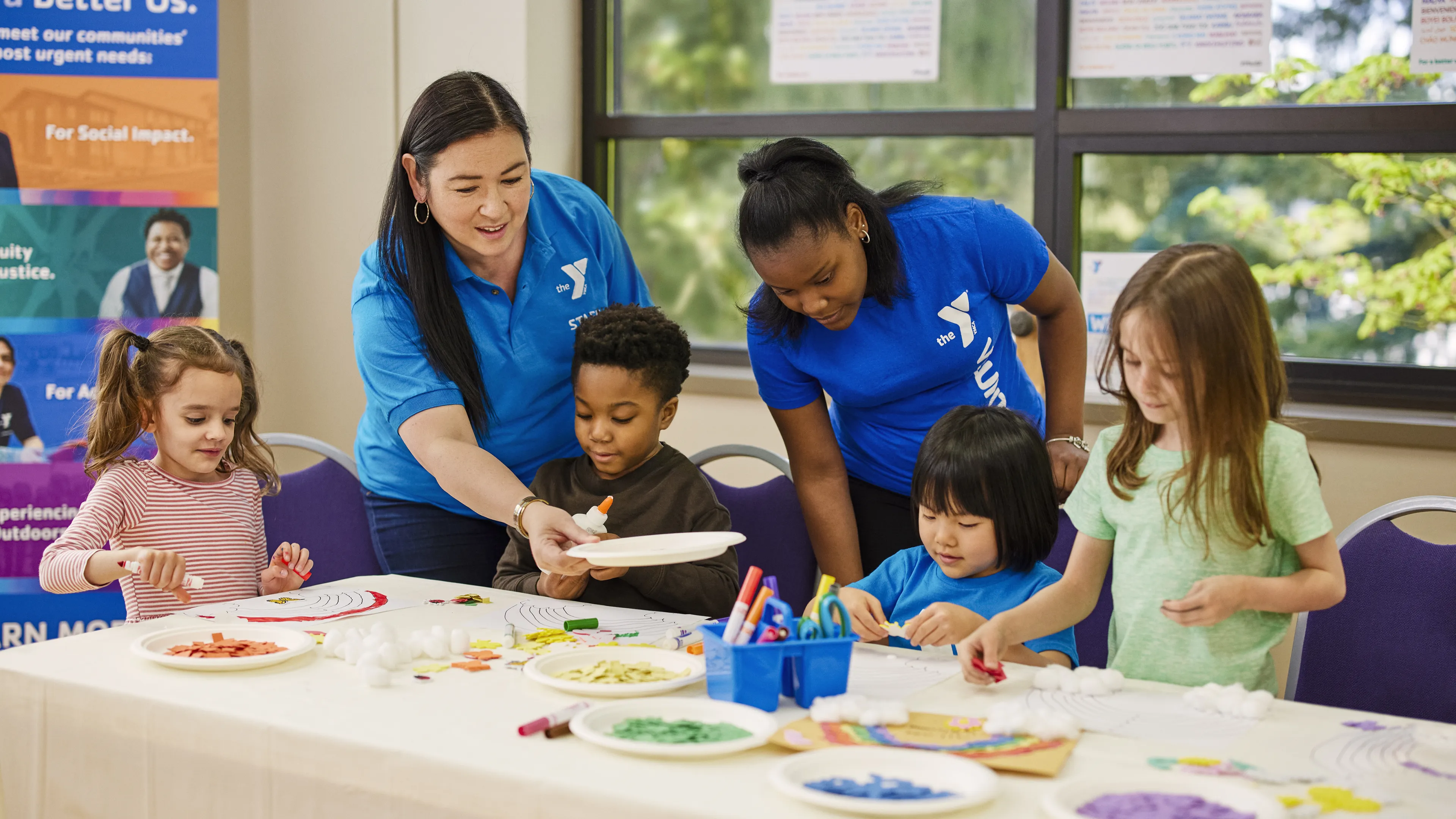 Teachers and kids at after school care at YMCA