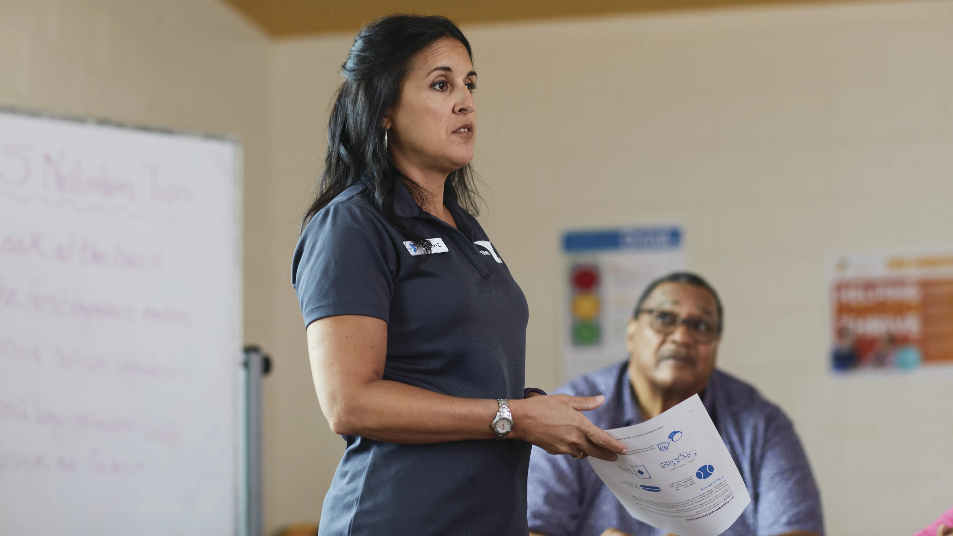 YMCA employee talking to group